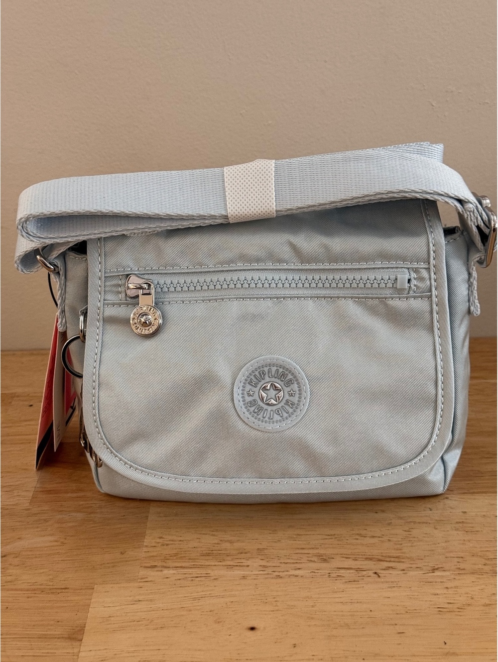 Kipling Light Blue Crossbody Bag with Monkey Charm